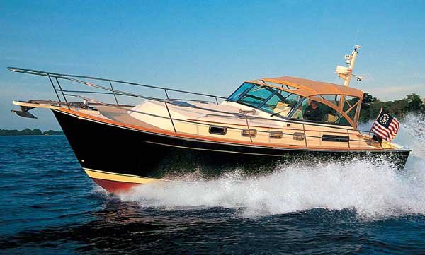 Powerboat Cruising Along Water