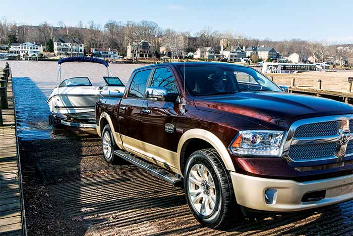Truck towing boat out of water