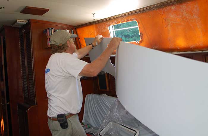 Fitting the Komatex panel in place