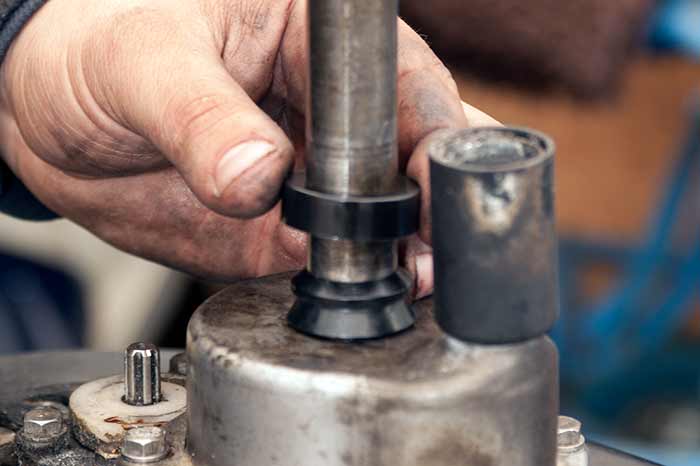 Push setting tool down on seal