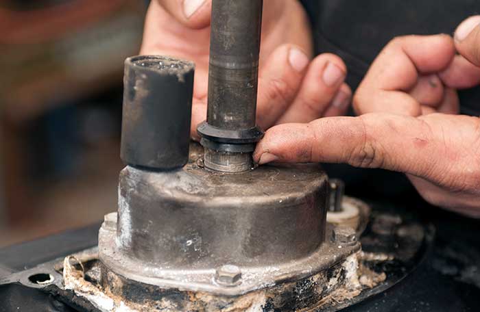 Slide off seal above pump housing