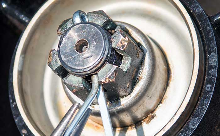 Tightening nut and making sure of alignment