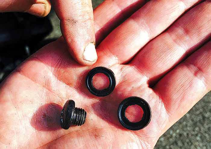 Comparing old and new drain screw gaskets