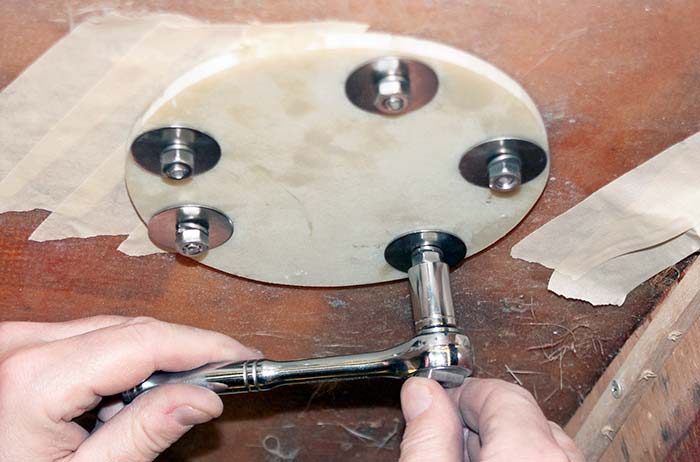 Install using larger fender washers