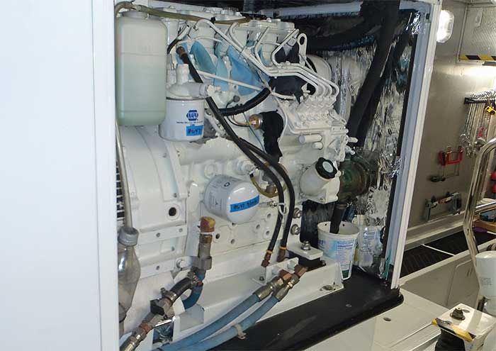 Removing white sliding panel from in front of boat generator