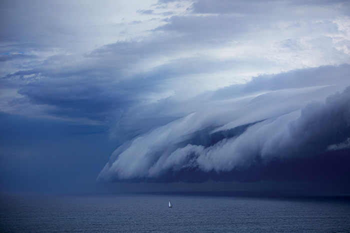 Open waters with large storm clouds coming in