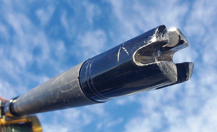 Up close view of a silver and navy gimbaled aluminum rod butt