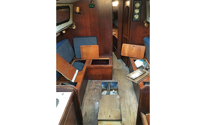 Interior cabin of a boat in the beginning stages of a demo.