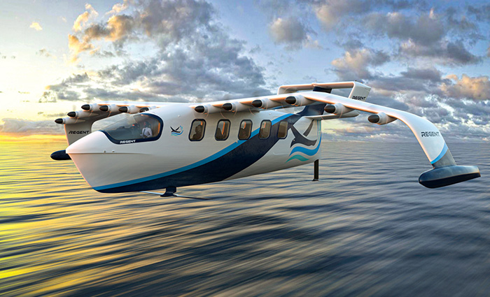 A white passenger ferry with black and blue stripes landing on water at sunset.