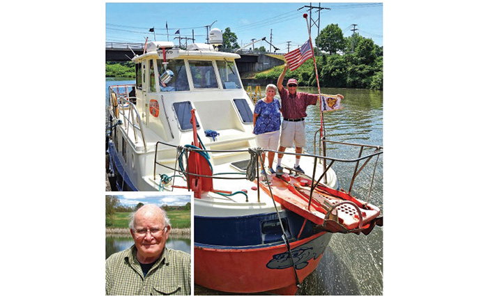 A senior adult couple standing at the front of an orange and white boat on open waters with a secondary image a senior male at the bottom corner.