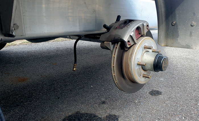 Up-close view of a broken brakeline fitting.