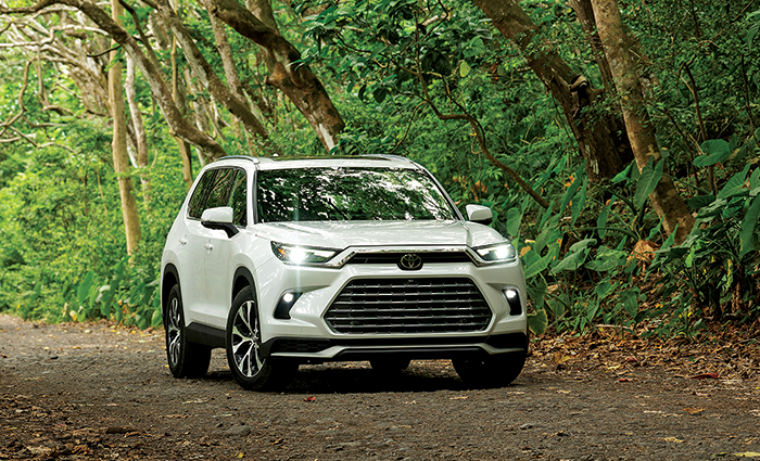 Toyota’s 2026 Grand Highlander HEV parked on a dirt road.